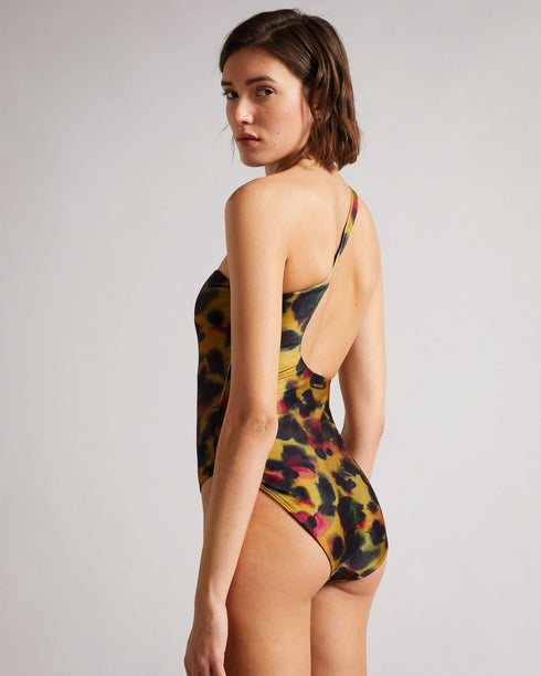 TELSA-Swimwear-Unleash your wild side with our Watercolour Leopard print. TELSA is a must-have for making a lasting impression at the beach, thanks to its striking print and unique one-shoulder style. Ted Baker womenswear collection Swimsuit One shoulder Crossover strap Scooped back cut out Straight neckline Ted Baker branded Mathea is 5'10.5" / 1.79m and wears Brown in a size S- Ted Baker Romania